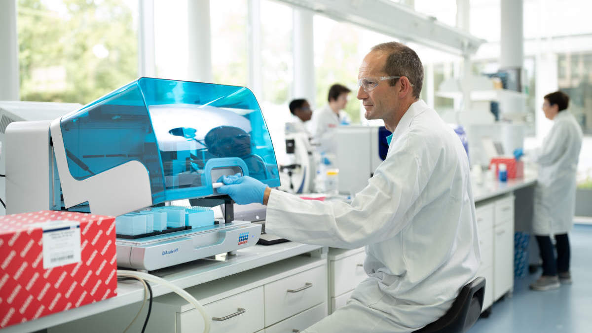 Liquid Biopsy content World images, instruments, laboratory, QIAcube HT, miRNA, automation